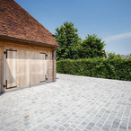 Natural grey kandla cobblestone (natural stone) realisation