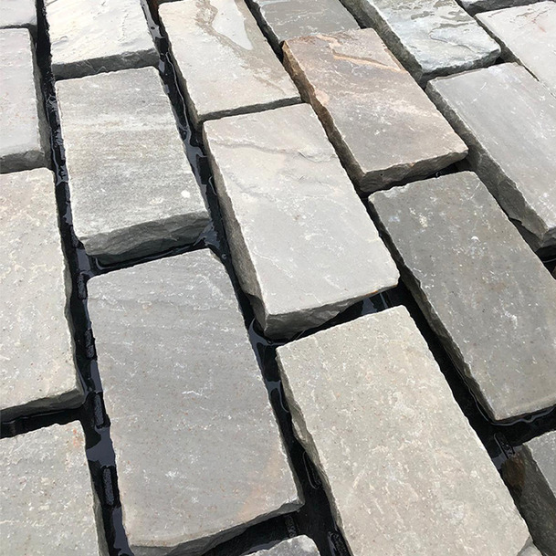 Natural grey kandla cobblestone (natural stone) side view